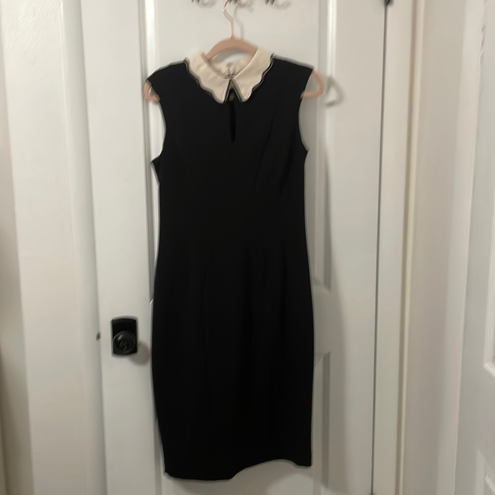 NY & Co Eva Mendez black dress with keyhole front. Size 8.